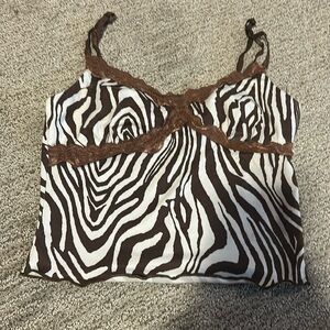 xs brown and white zebra print tank top. Worn a decent amount of times.